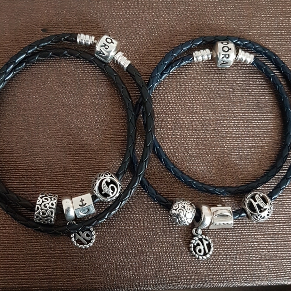 Two Pandora bracelets and charms